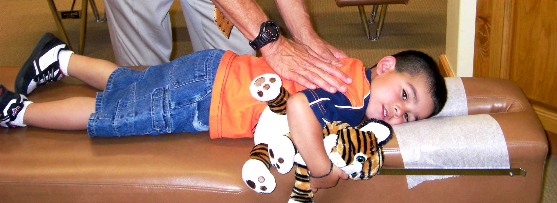 child receiving pediatric chiropractic in Salinas