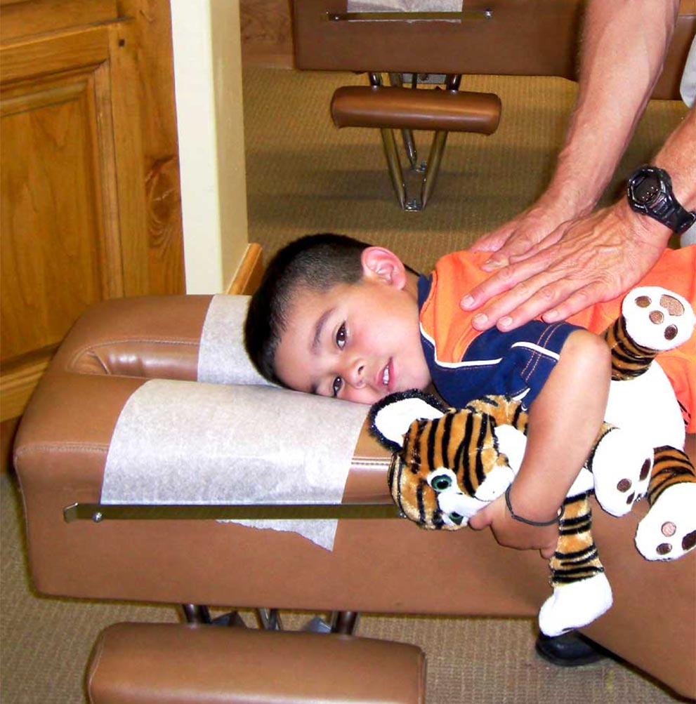 child receiving pediatric chiropractic in Salinas